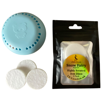 Blue diffuser, white discs, and packaging labeled 'Snow Fairy' by L.S. London on a white background.